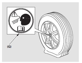 Den Aufkleber ‘‘Reifendichtmittel im Reifen’’